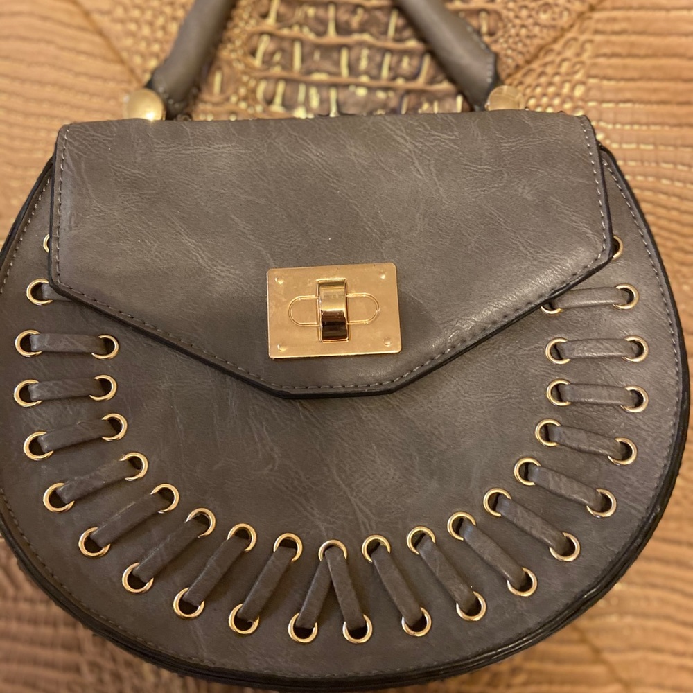 Coming out hand bag